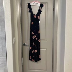 New with tag black floral jumpsuit with tie back